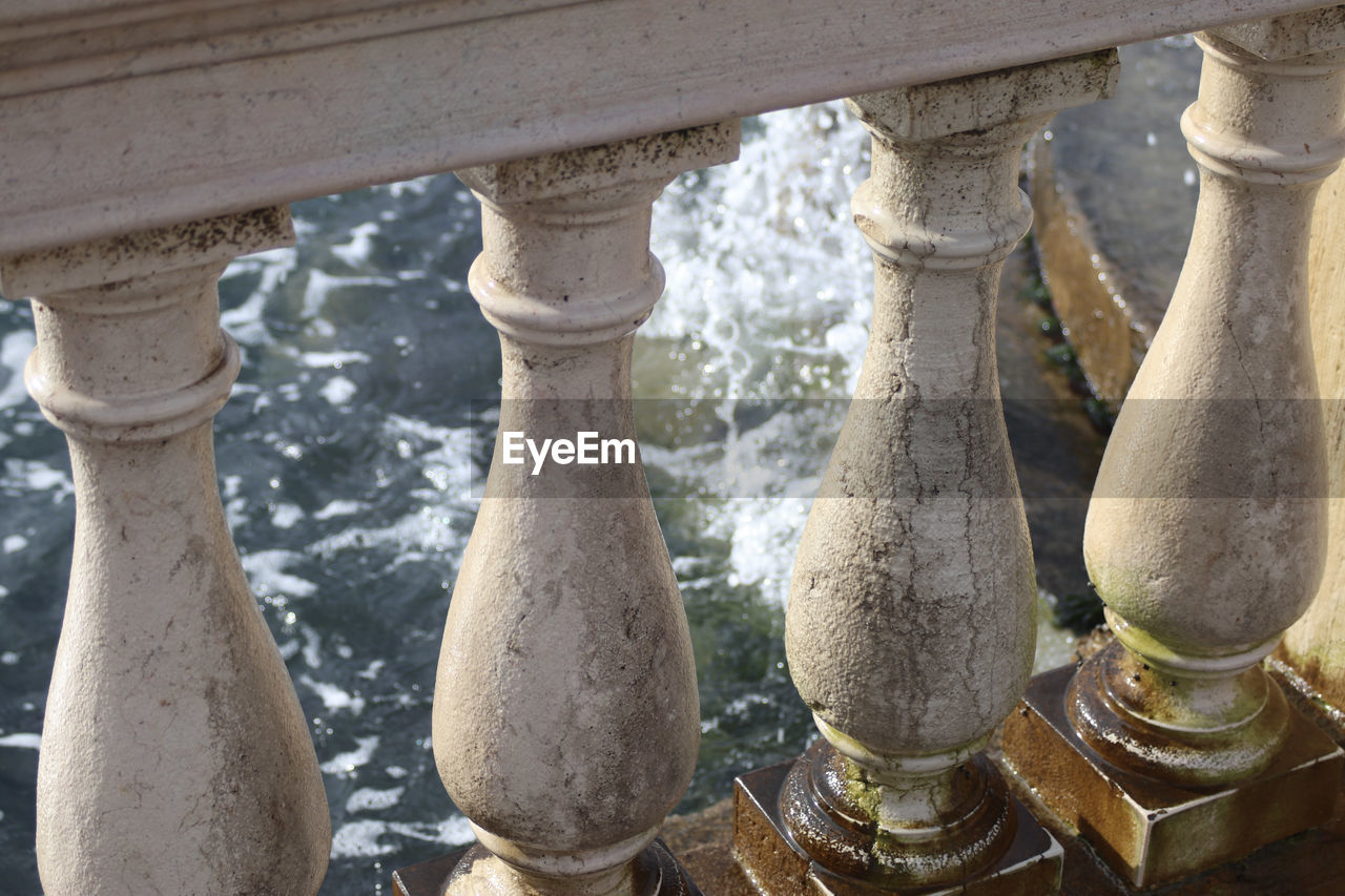 CLOSE-UP OF ARCHITECTURAL COLUMNS OF WATER