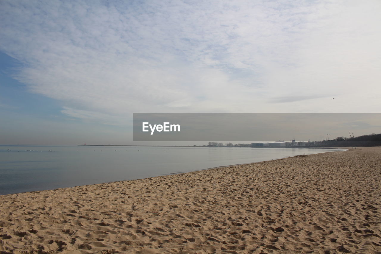 Scenic view of beach against sky