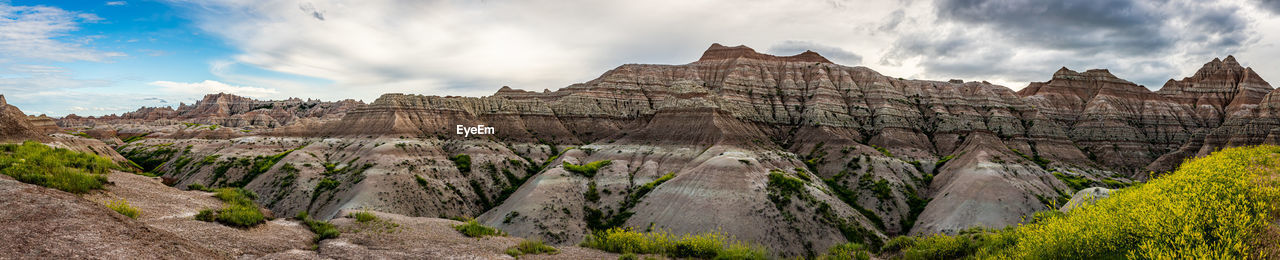 PANORAMIC VIEW OF LANDSCAPE AND MOUNTAINS