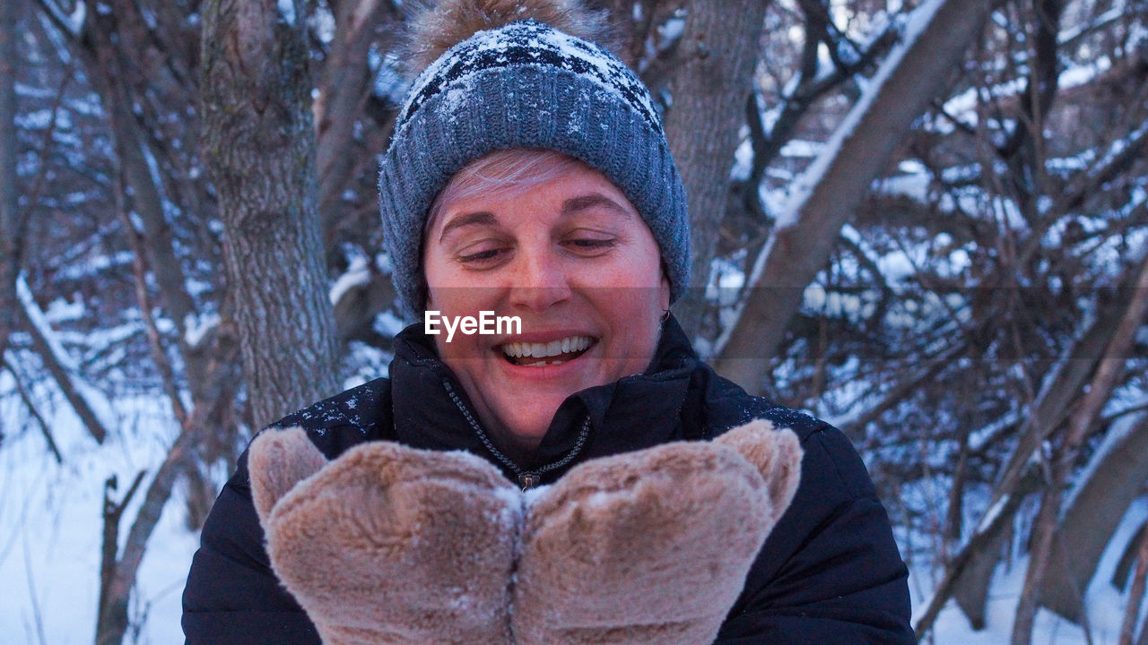 Portrait of smiling women in snow