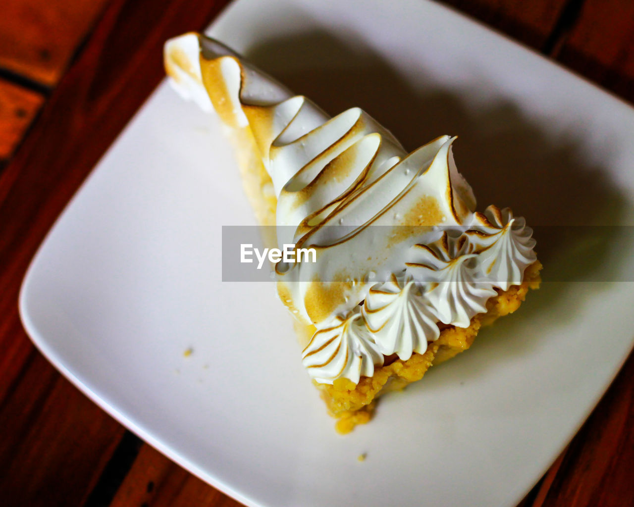 High angle view of cake in plate on table