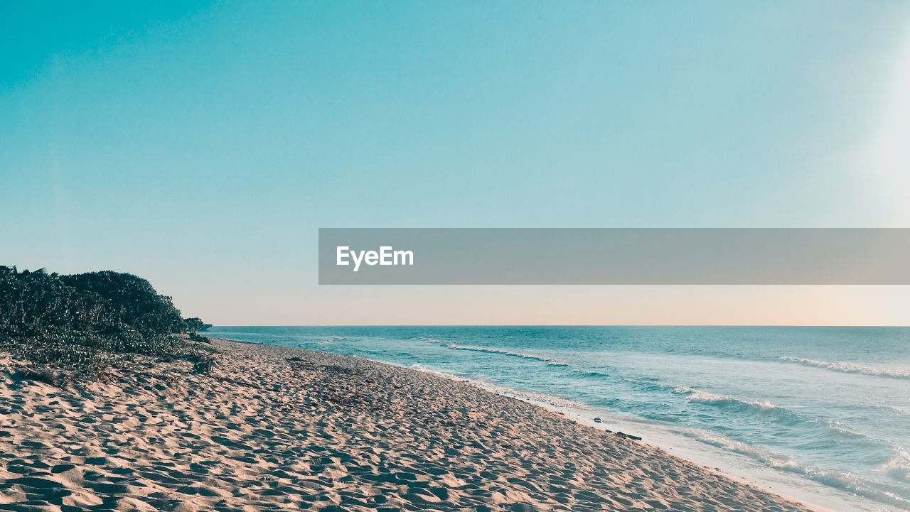 Scenic view of sea against clear sky