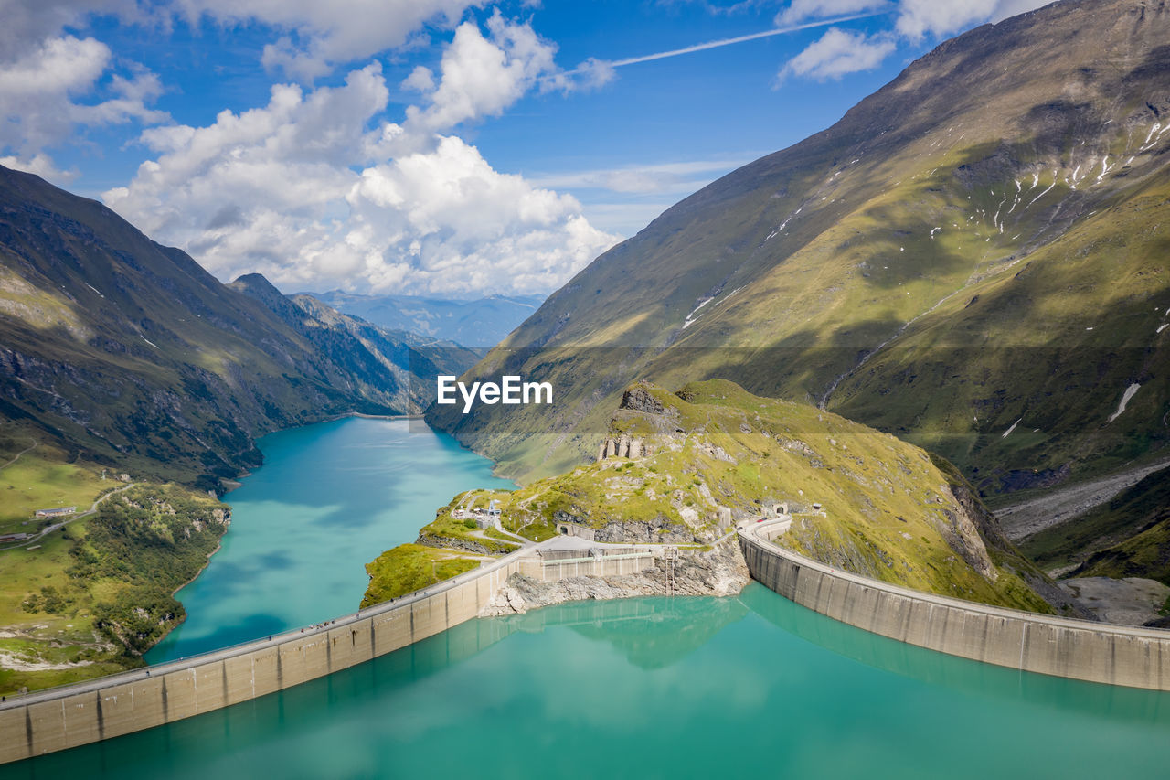 Aerial of dam and alpine water reservoirs, kaprun, austria