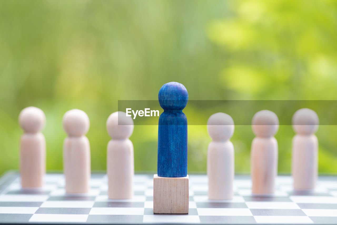 close-up of chess pieces against blurred background