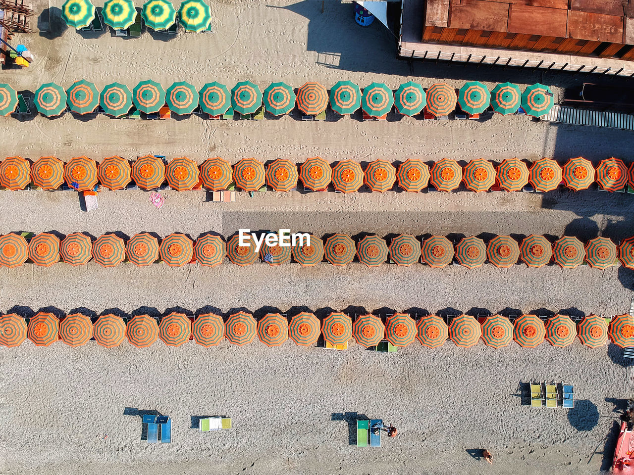 HIGH ANGLE VIEW OF BELL HANGING AGAINST BUILDINGS