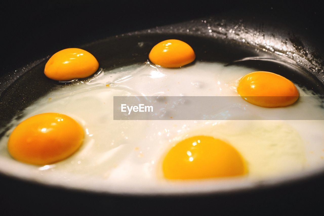 Sunny side up of egg being fried in cooking pan