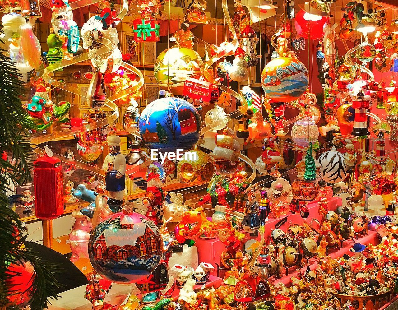 Close-up of christmas decorations and toys for sale