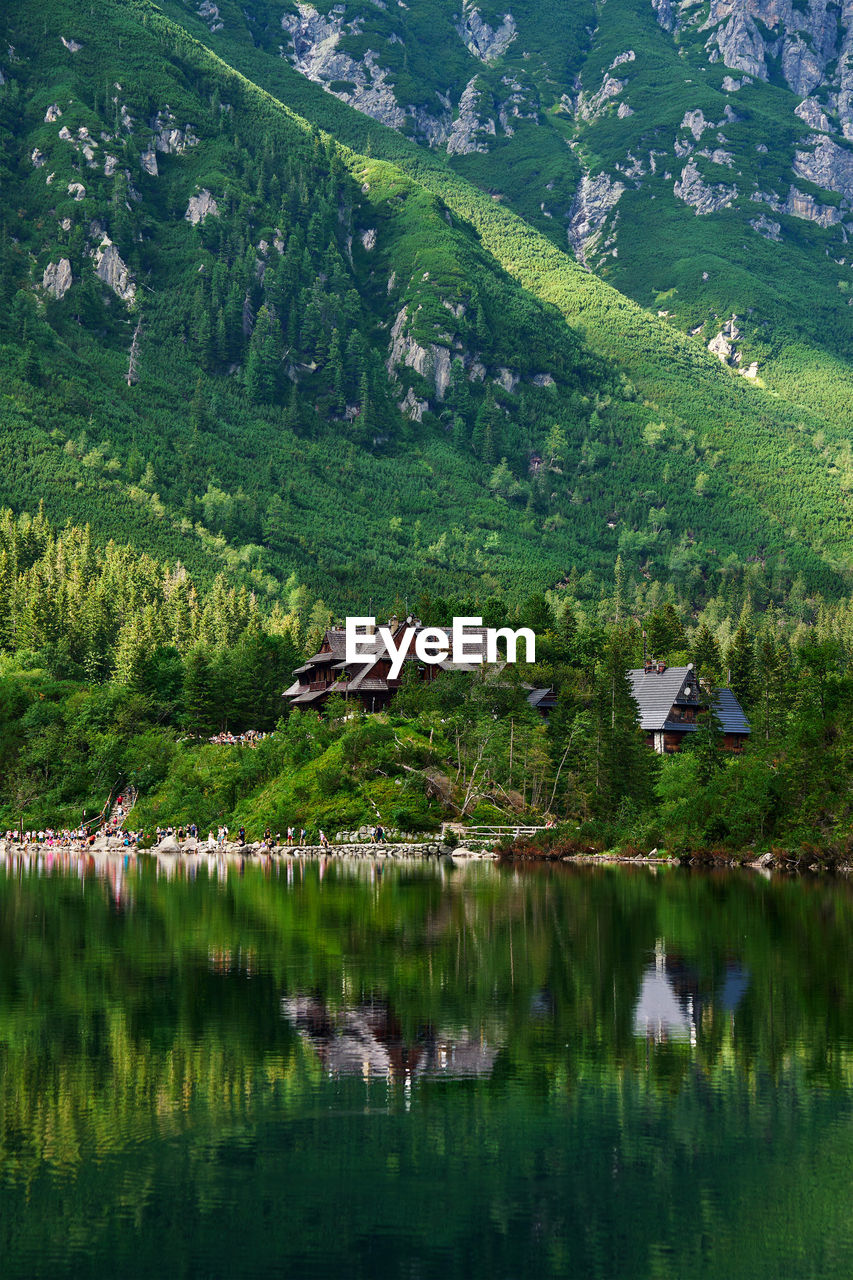 Mountains range near beautiful lake. tatra national park in poland. morskie oko or sea eye lake