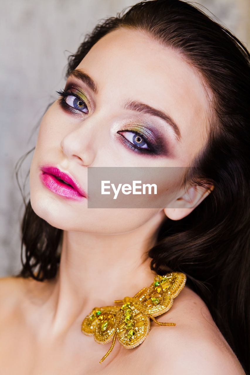 Close-up portrait of teenage model with make-up