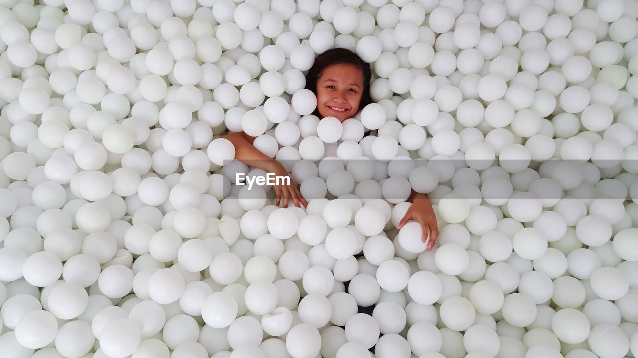 Woman enjoying in ball pool