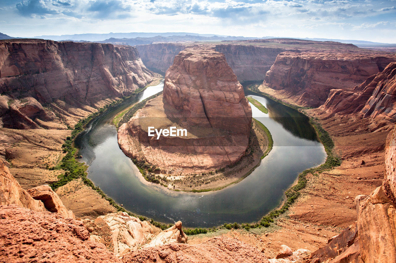 Aerial view of rock formations in river