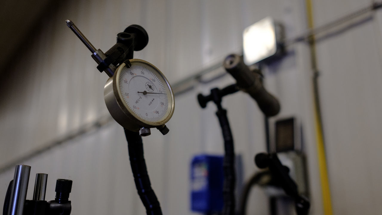 Low angle view of gauge in factory
