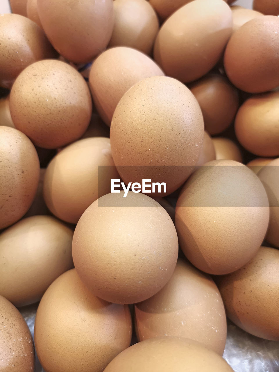 Background of fresh eggs for sale at a market