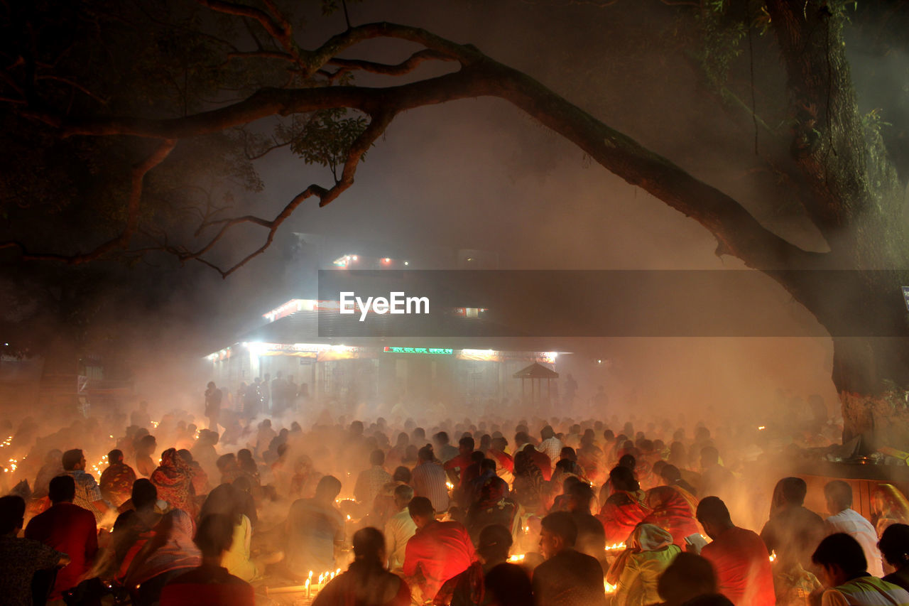 High angle view of crowd at temple at night