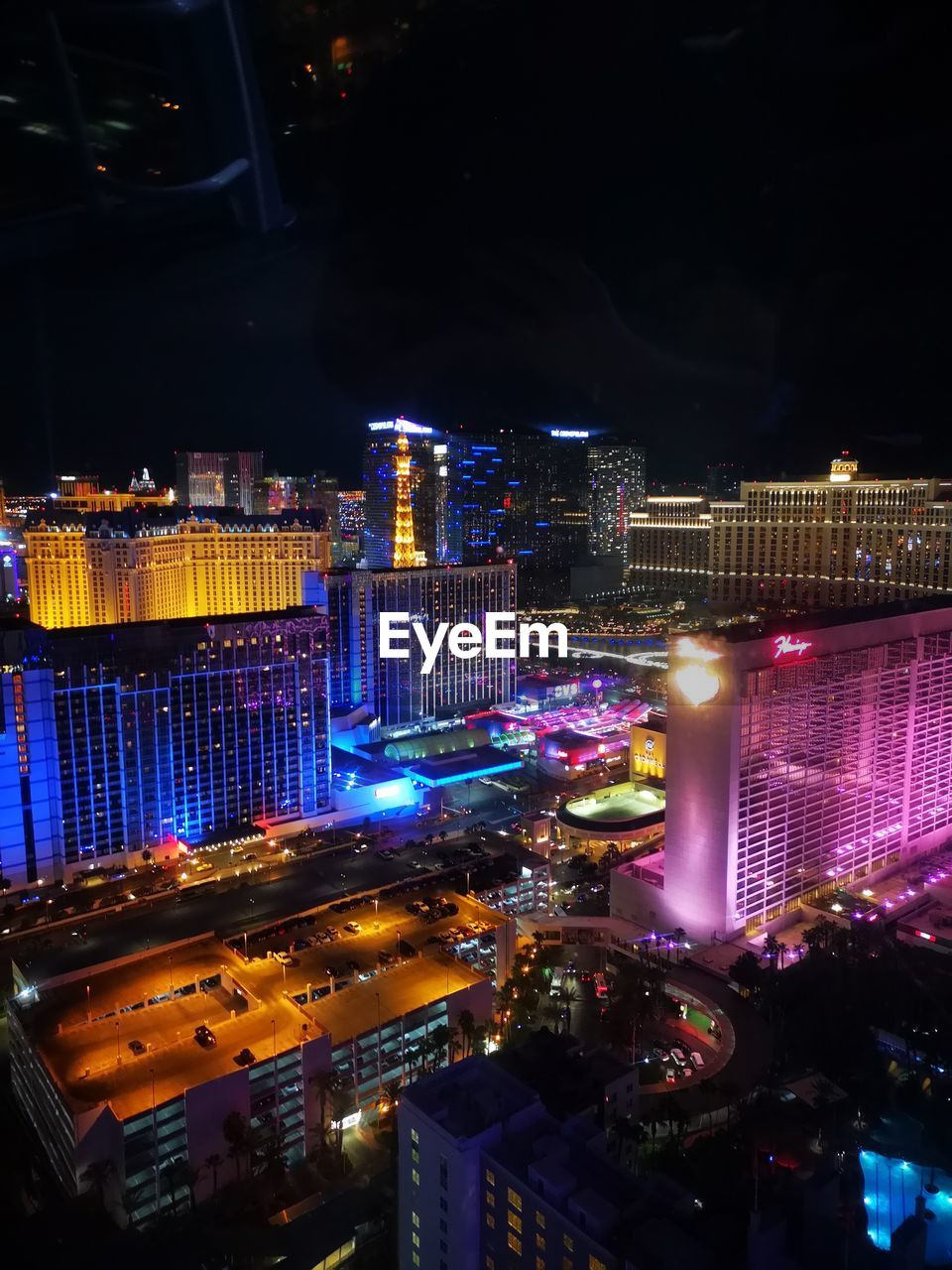High angle view of illuminated buildings at night