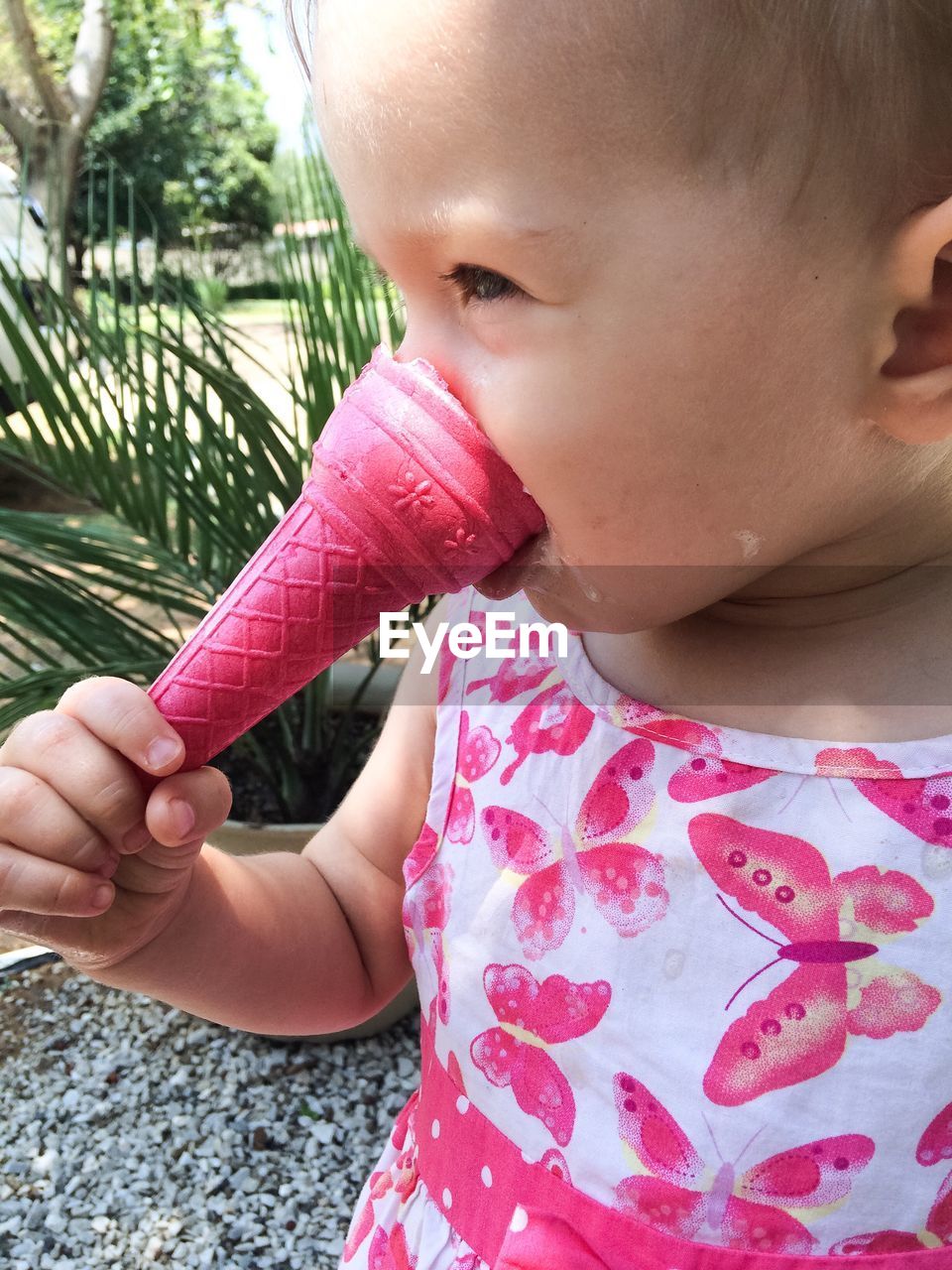 Close-up of baby girl eating ice cream