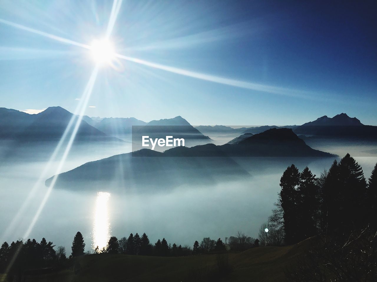 Scenic view of silhouette mountains against sky