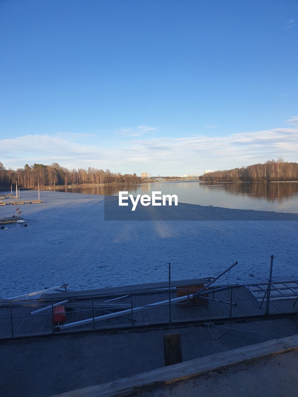 VIEW OF LAKE AGAINST BLUE SKY