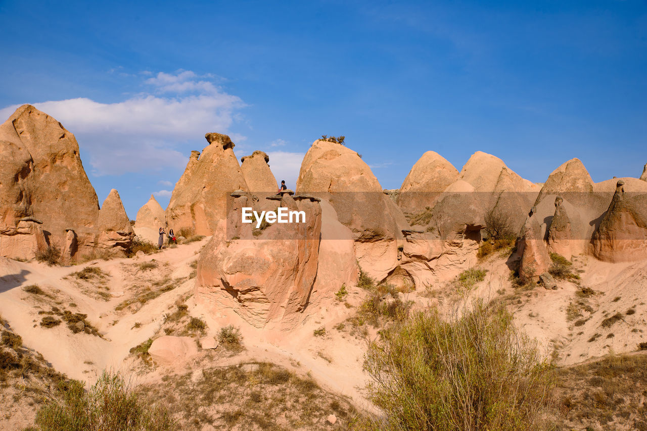 ROCK FORMATIONS AGAINST SKY