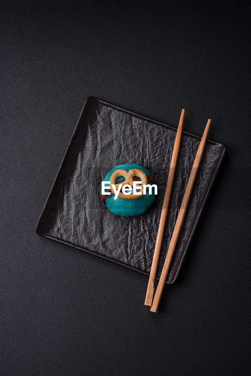 high angle view of pencils over black background