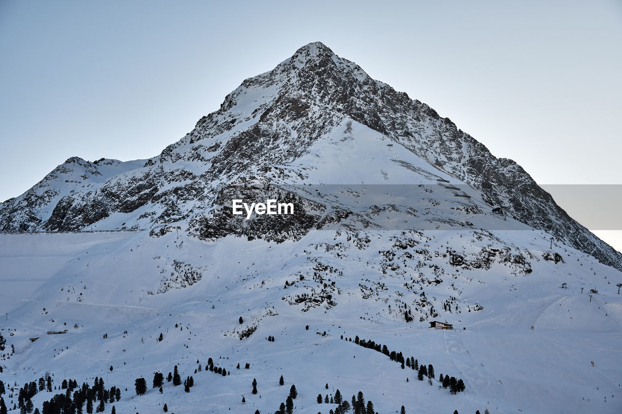 Mountain peaks in winter. dusk, nature, scenics.