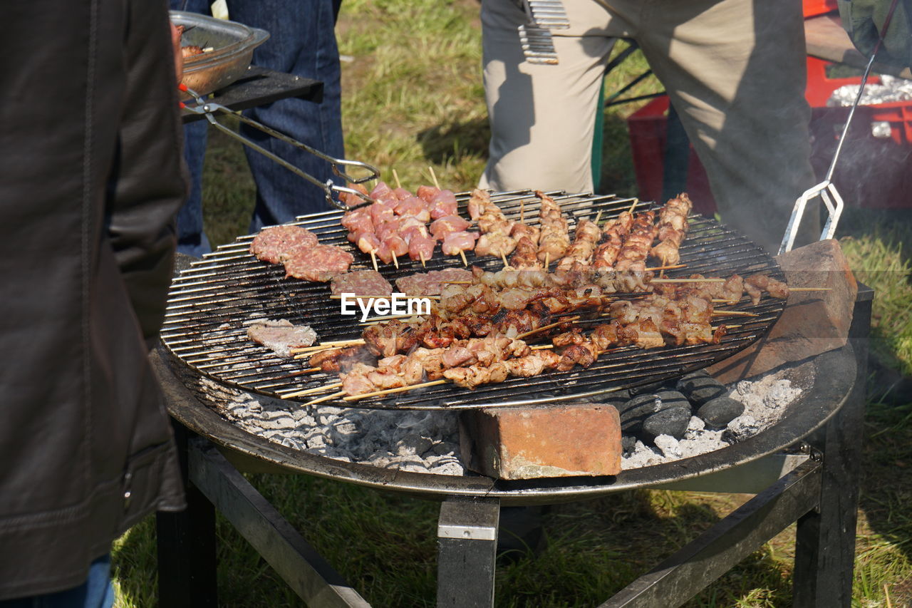 Close-up of meat on grill