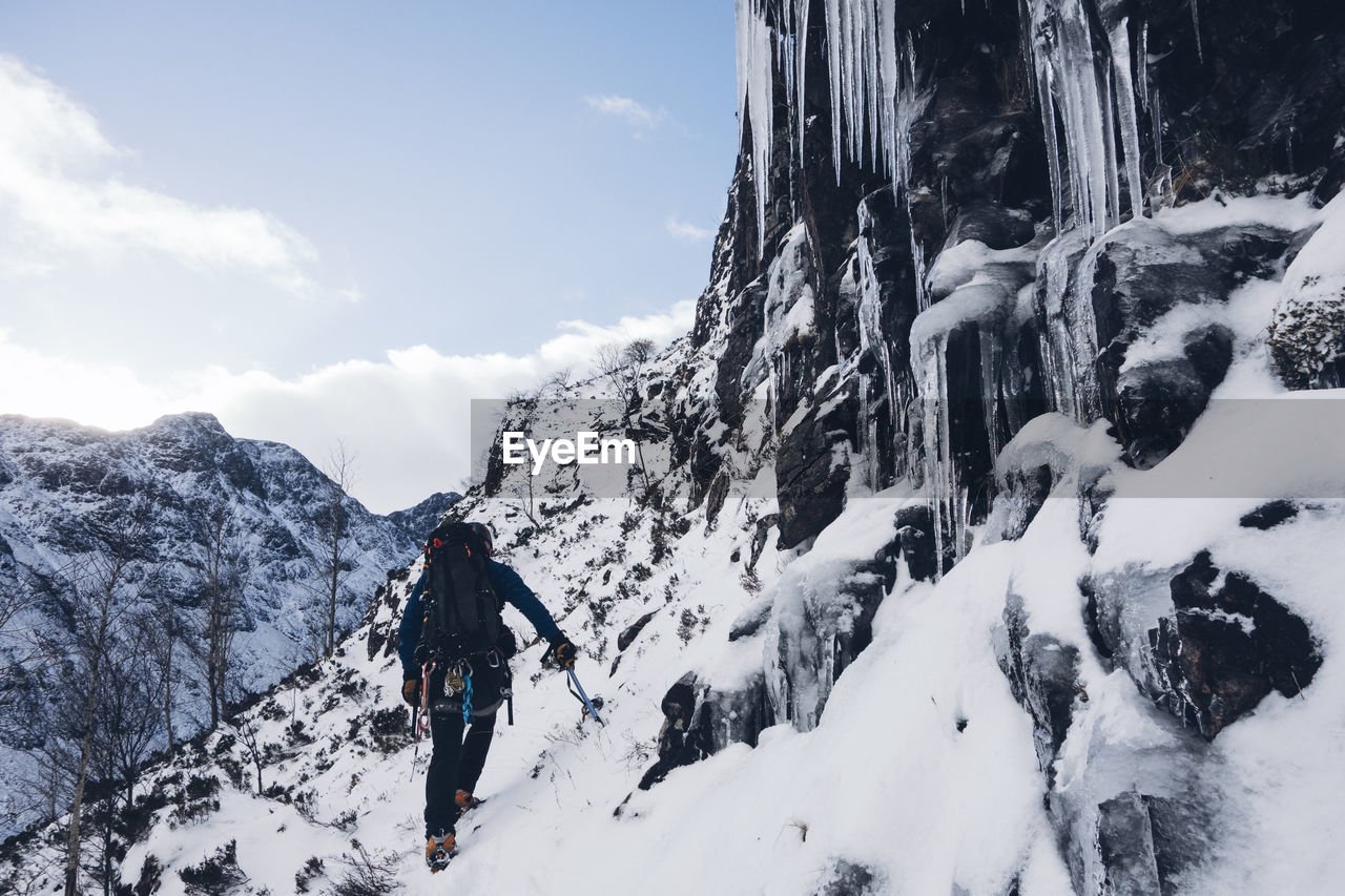 Panoramic view of snowcapped mountain against sky