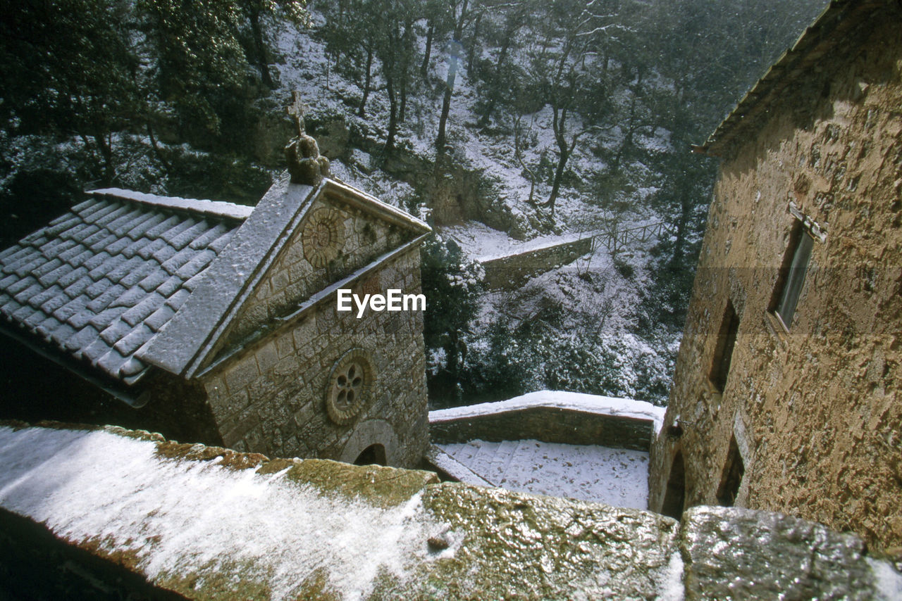 Snow covered eremo delle carceri at assisi