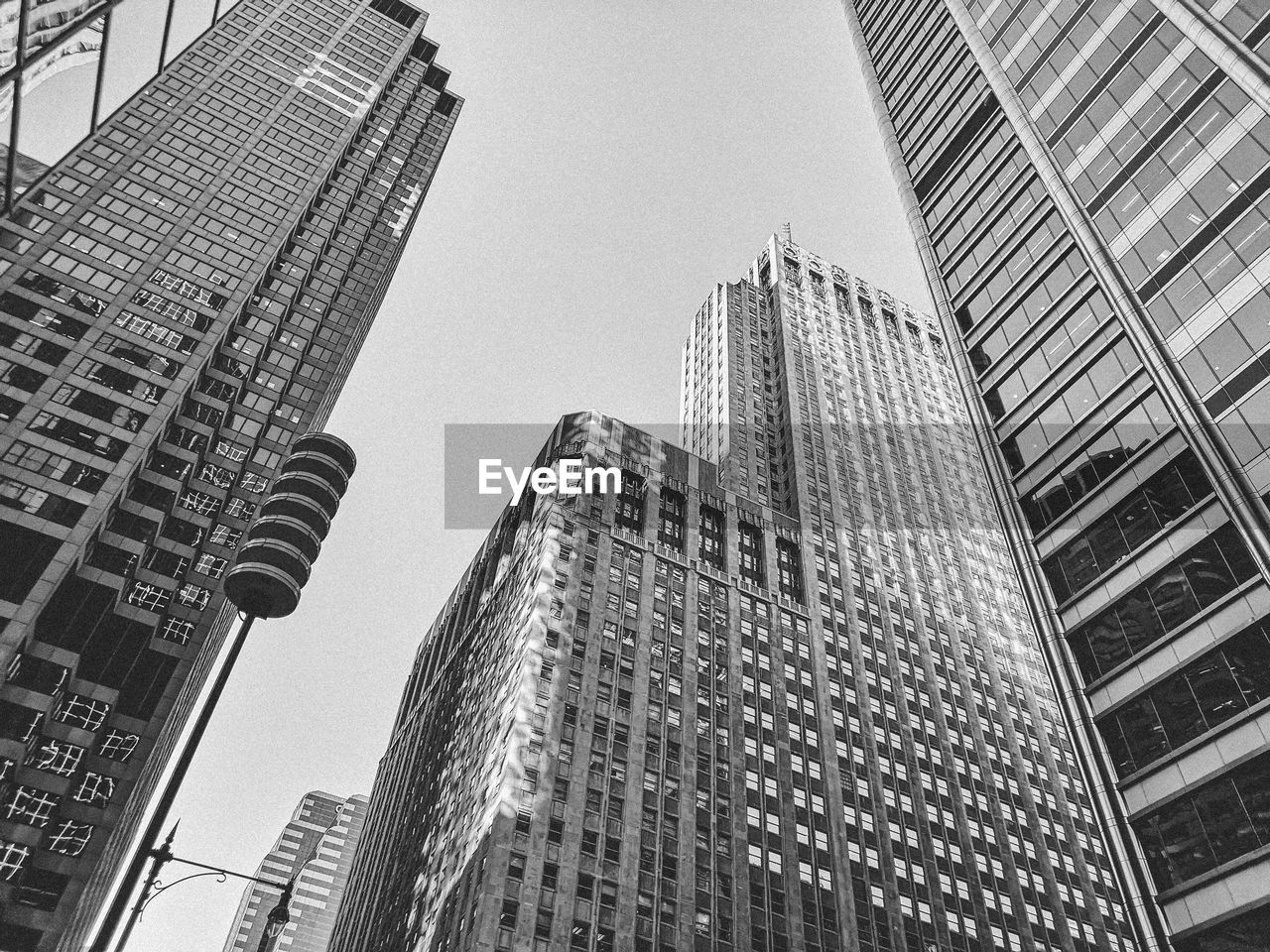 Low angle view of modern buildings against clear sky