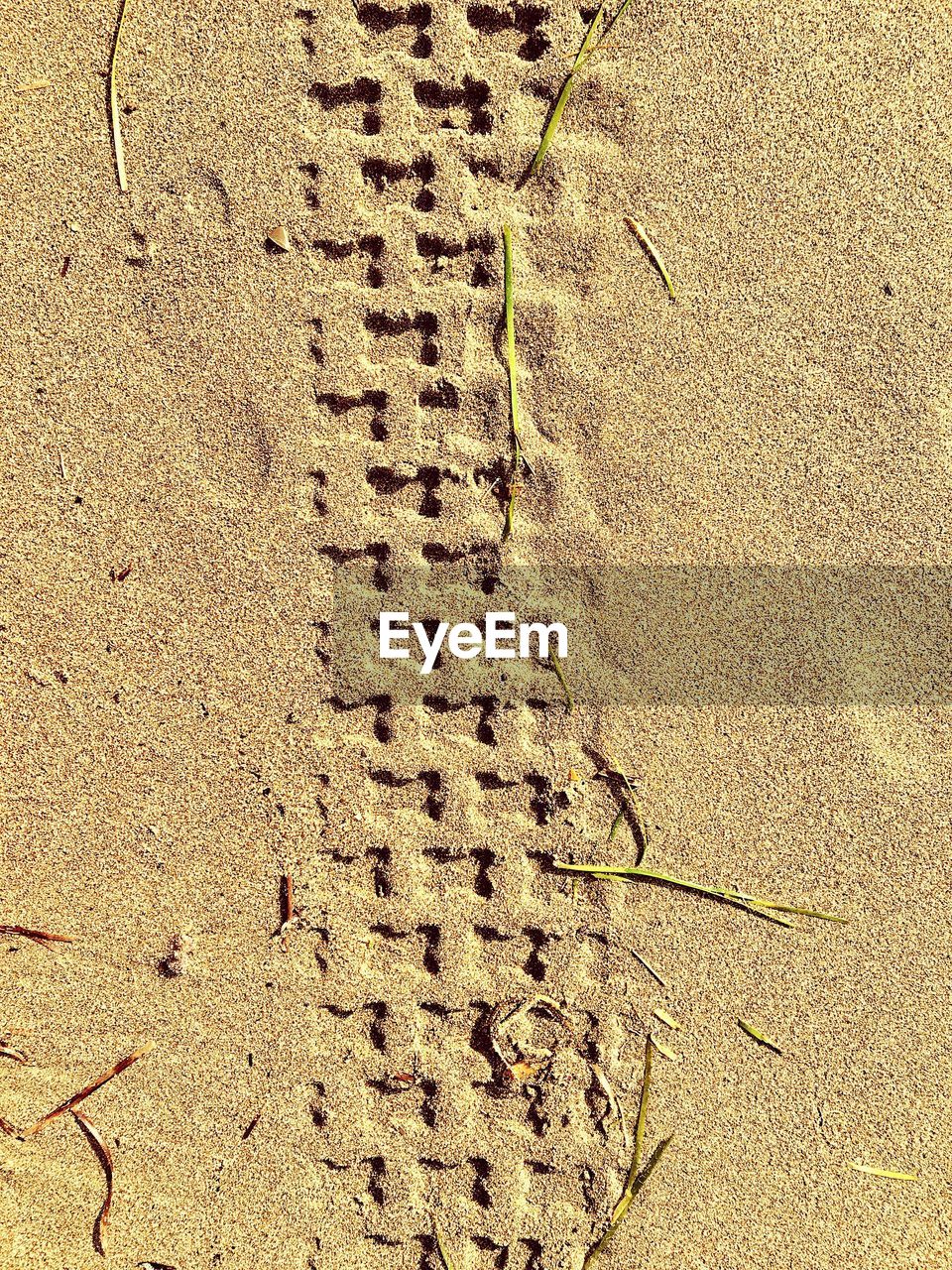 FULL FRAME SHOT OF SAND ON FIELD