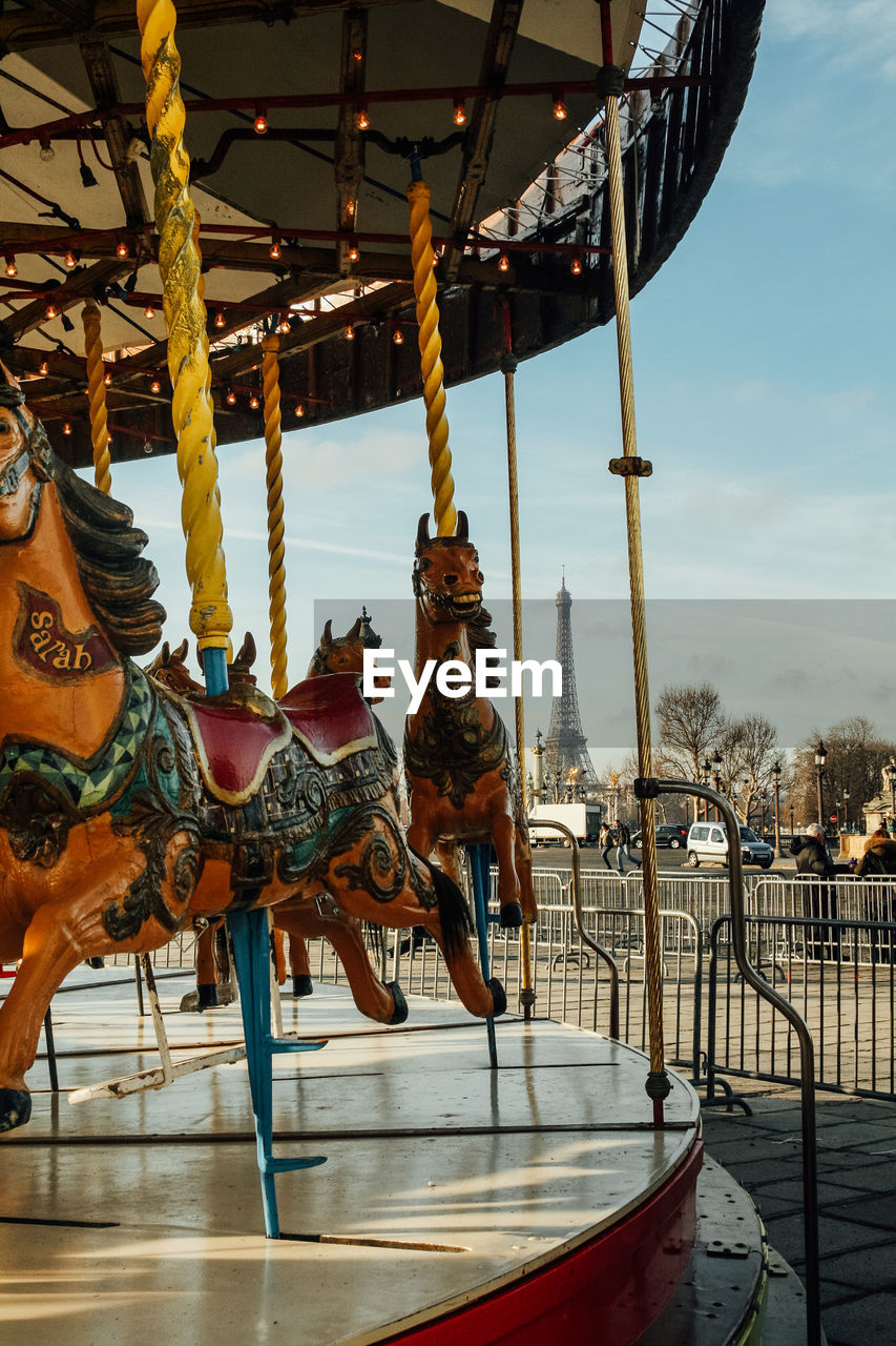 Carousel with eiffel tower in background