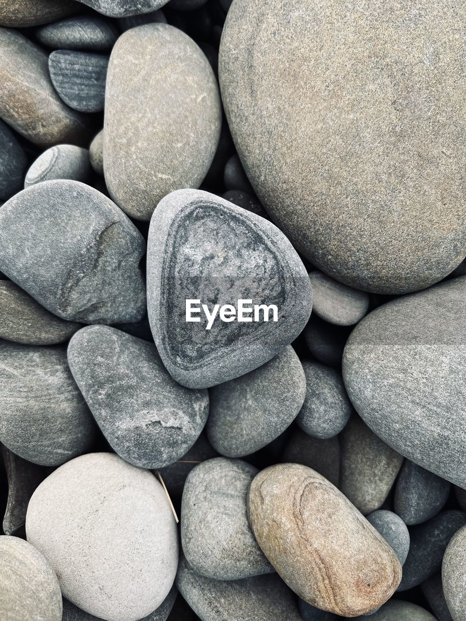 pebble, large group of objects, rock, gravel, full frame, backgrounds, stone, abundance, no people, close-up, shape, high angle view, still life, gray, textured, medicine, healthcare and medicine, dose, pill, directly above, nature