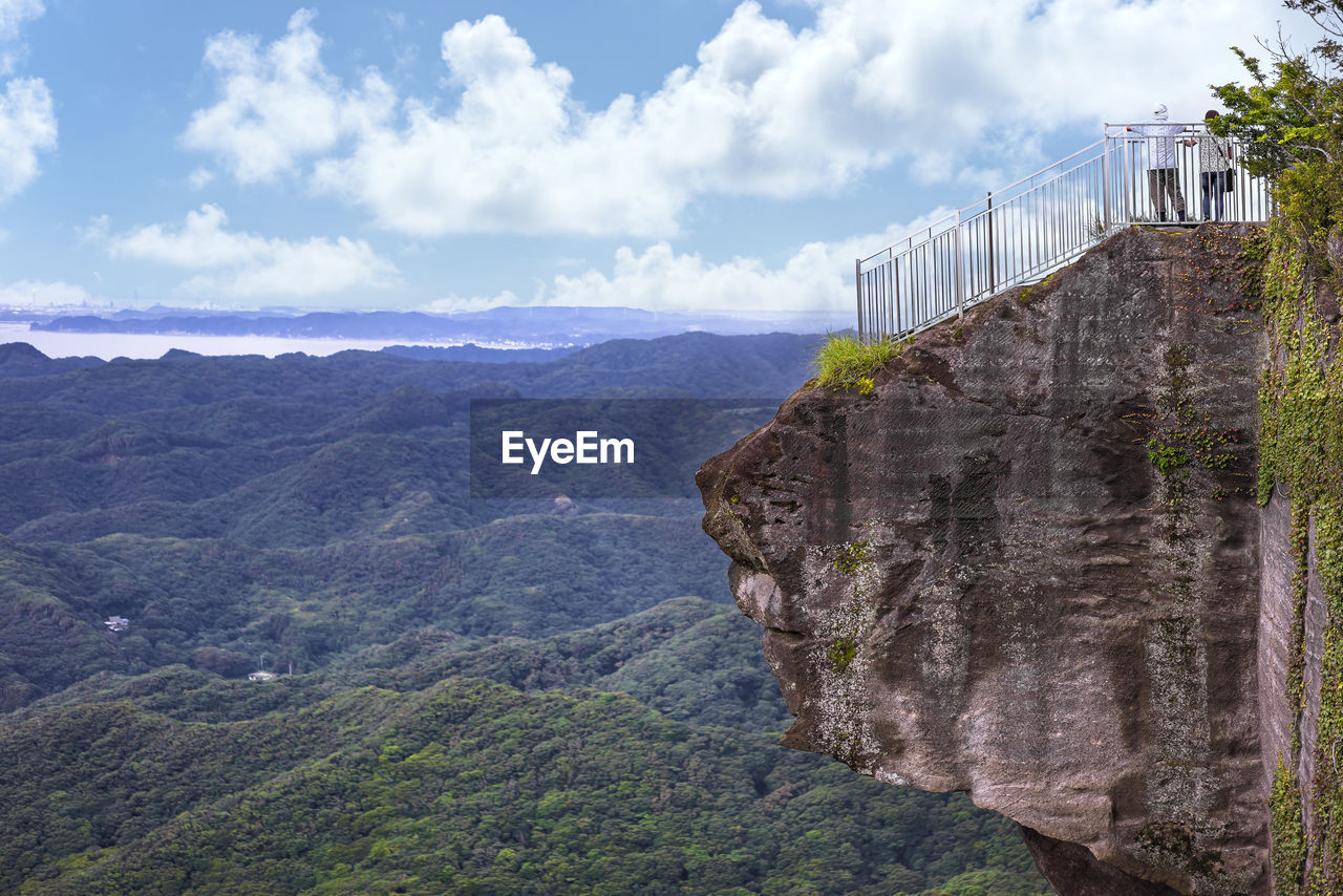 VIEW OF MOUNTAIN AGAINST CLOUDY SKY