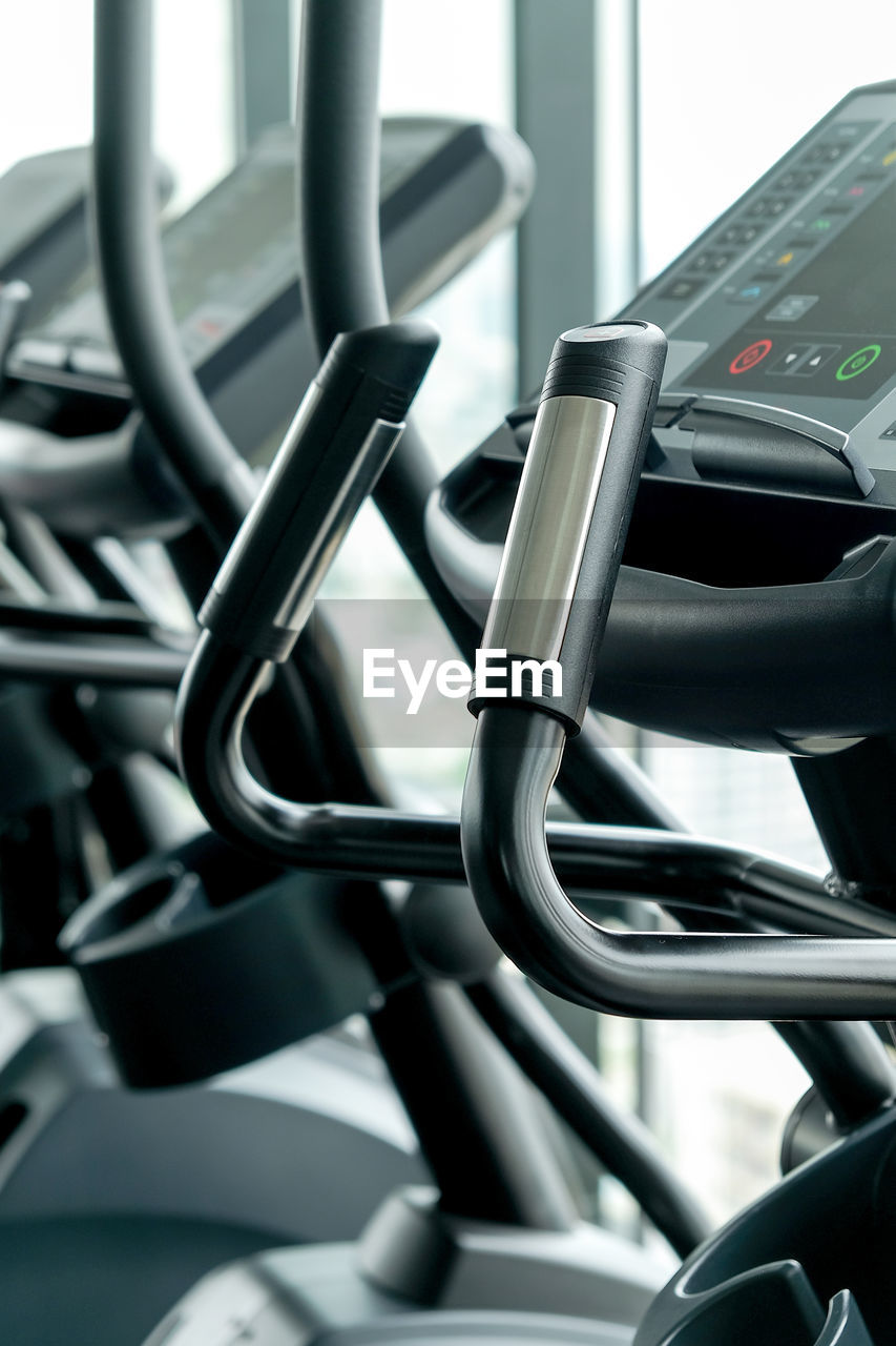 Detail image of treadmill in fitness room background 