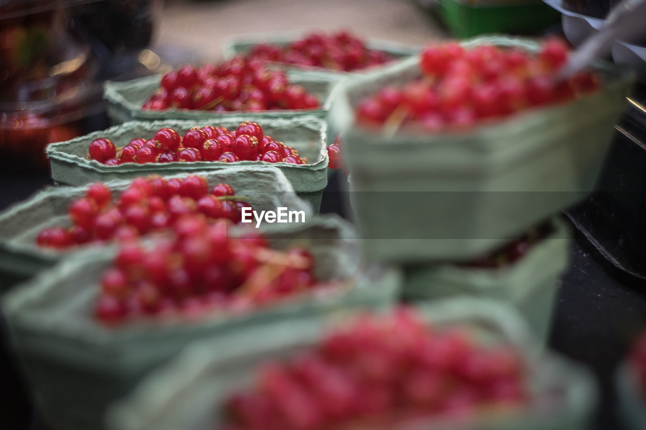 Close-up of fruits in container at market