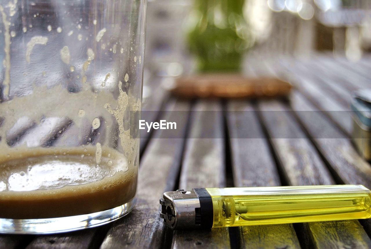 CLOSE-UP OF BEER ON TABLE