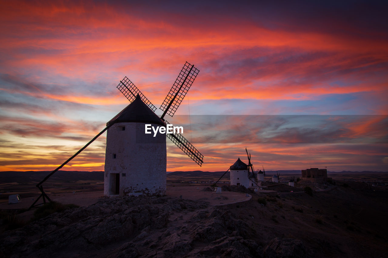 scenic view of sea against orange sky