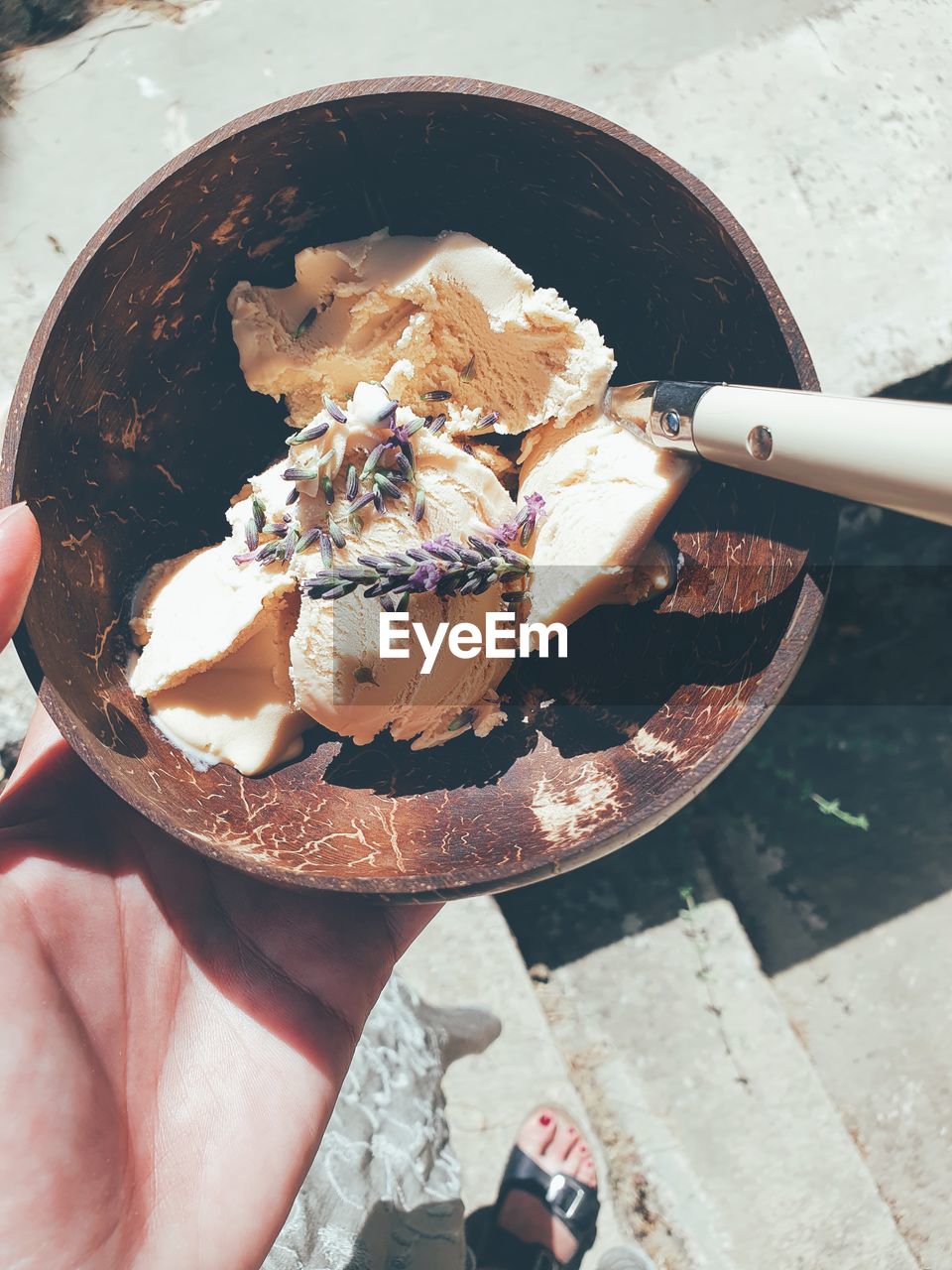 Close-up of person holding ice cream cone
