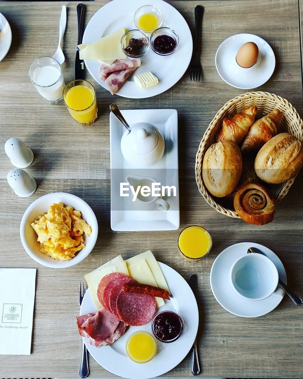 HIGH ANGLE VIEW OF BREAKFAST SERVED WITH FOOD