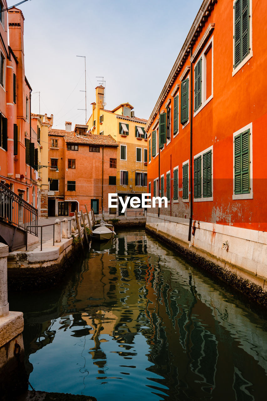 Typical canal in venice with colorful houses