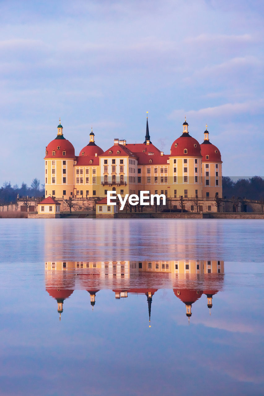 Reflection of buildings in lake