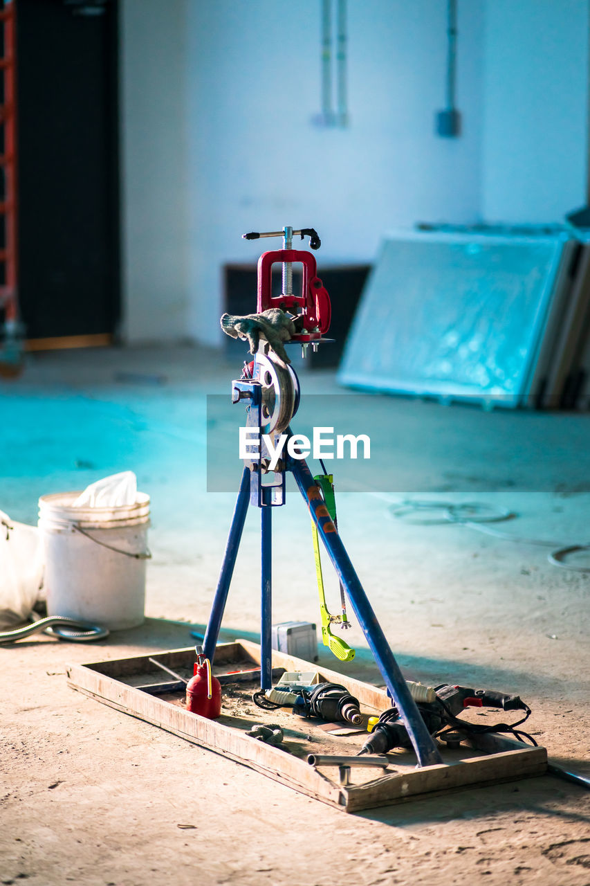 Manual mechanical steel iron metal wire bending device in a construction site.