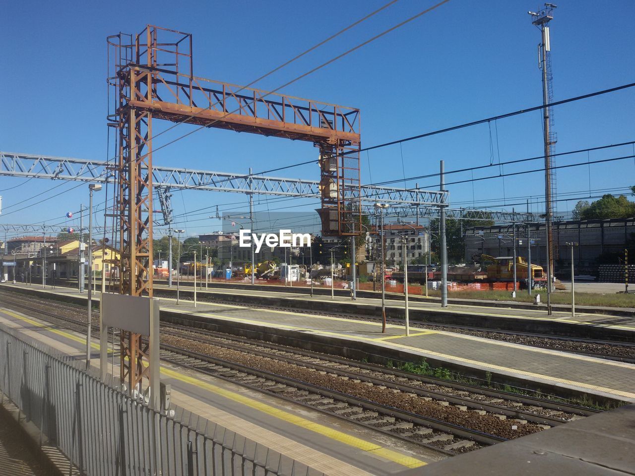 Railroad tracks against clear sky