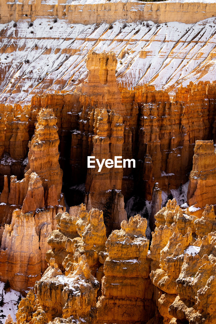 Close up view of bryce canyon national park hoodoos in winter in southern utah usa showing orange