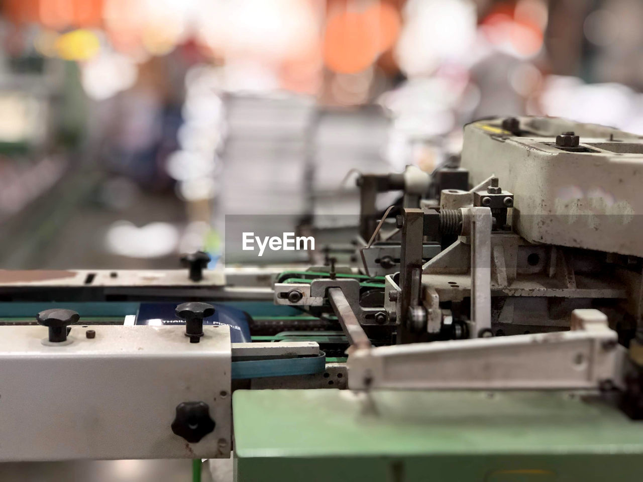 Close-up of machinery in printing press