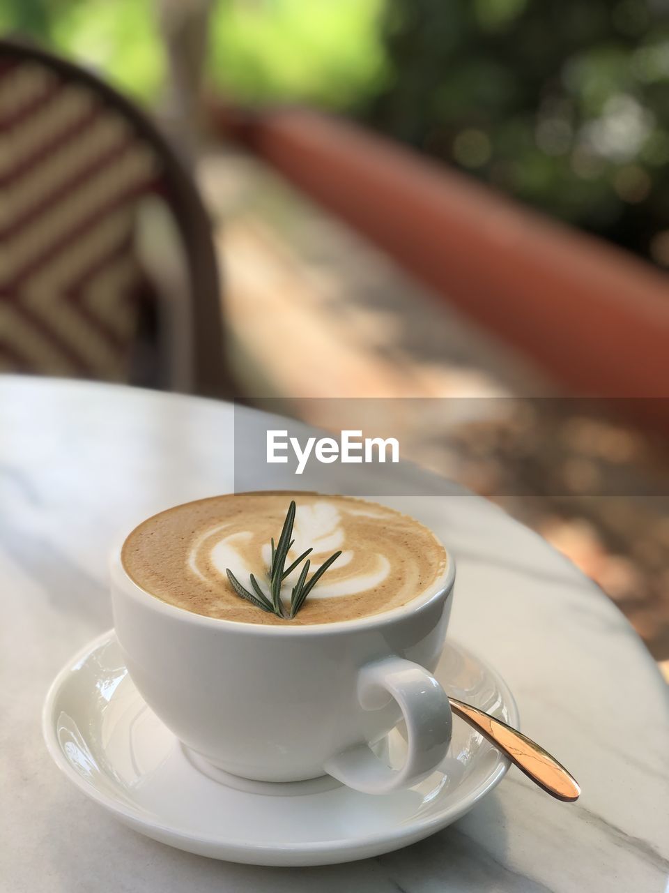 Close-up of coffee cup on table