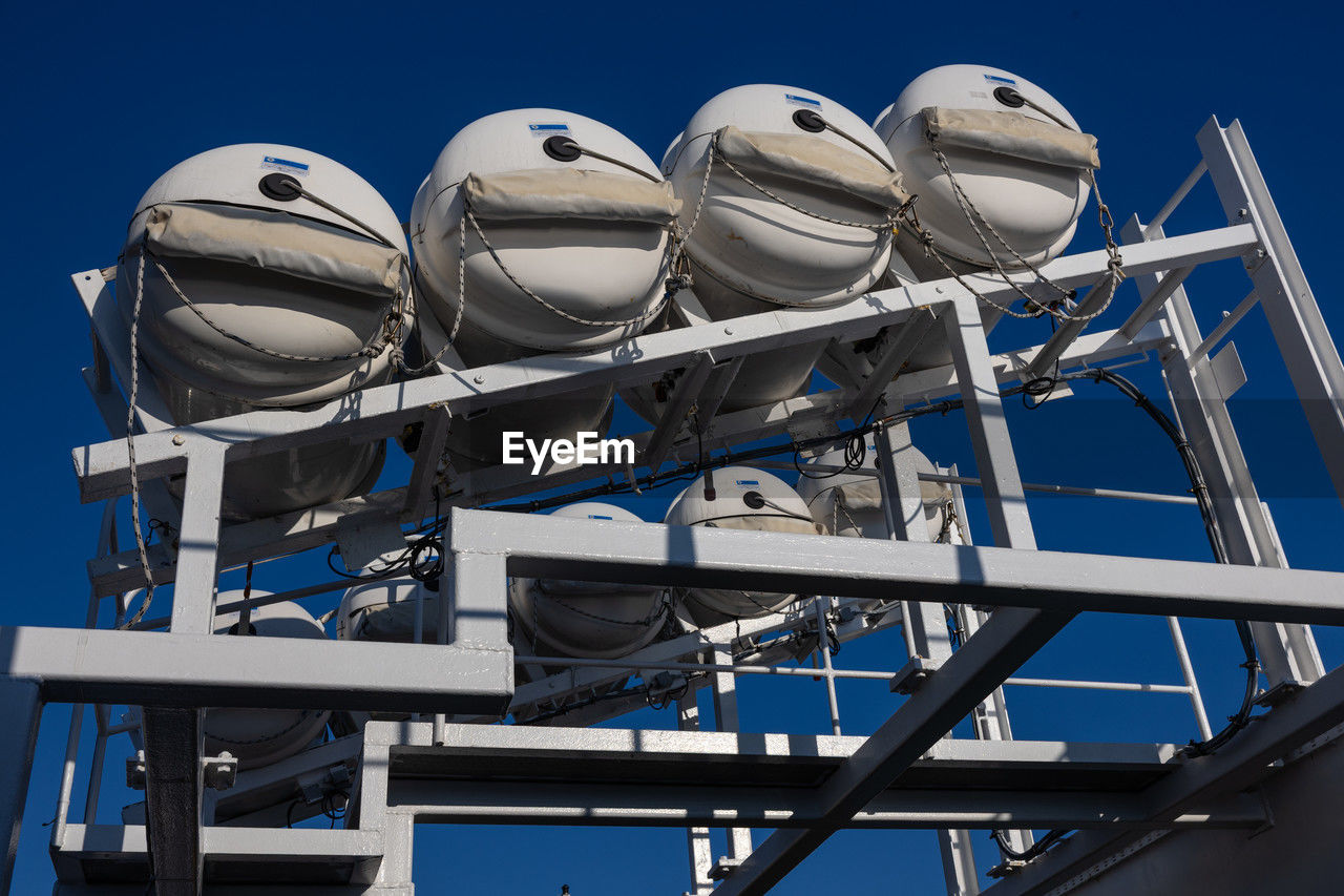 blue, sky, clear sky, architecture, no people, nature, day, outdoors, built structure, vehicle, low angle view, sunny