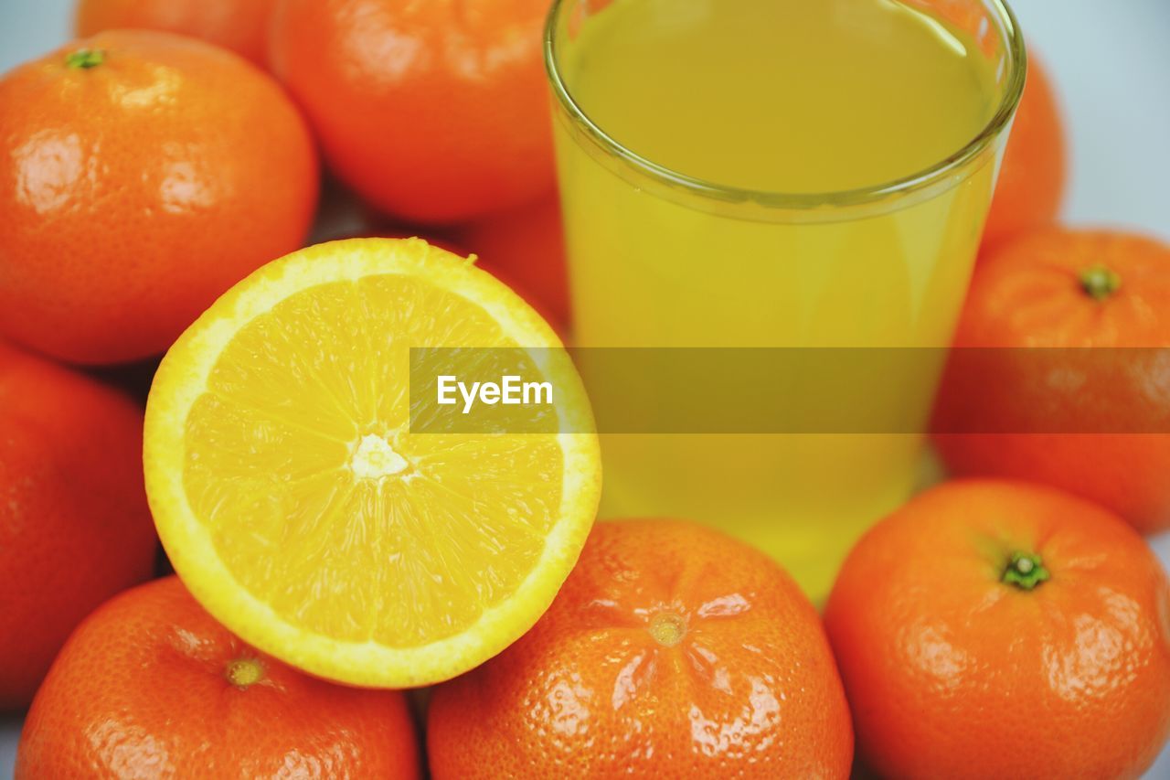 Close-up of oranges and juice