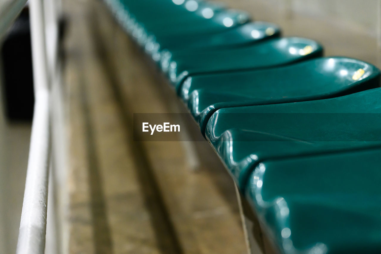 Closeup of audience seats on the sport stadium. concept of loneliness and confinement