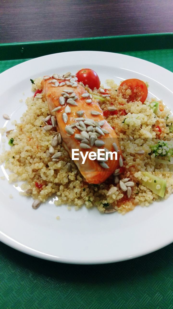 CLOSE-UP OF FOOD SERVED ON TABLE